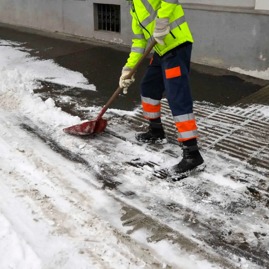 man removing snow